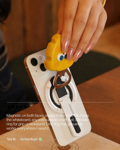 Keenii MagSafe mount in everyday transit scene with magnetic ring ready